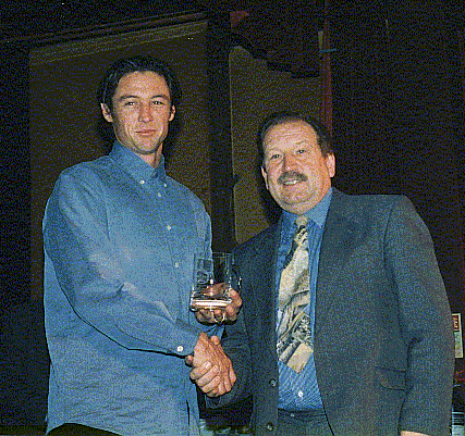 Last Year's Professional Greg Dimery recieving the Pro Award from a League Representative